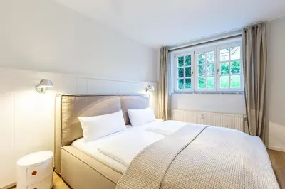 Ein Bett oder Betten in einem Zimmer der Unterkunft Hoop