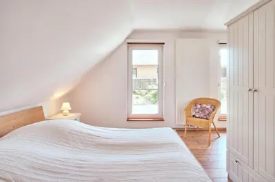 Ein Bett oder Betten in einem Zimmer der Unterkunft Finja