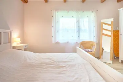 Ein Bett oder Betten in einem Zimmer der Unterkunft Finja
