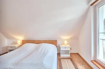 Ein Bett oder Betten in einem Zimmer der Unterkunft Finja