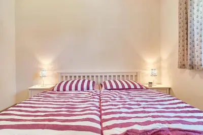 Ein Bett oder Betten in einem Zimmer der Unterkunft Findus