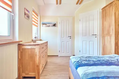 Ein Bett oder Betten in einem Zimmer der Unterkunft Findus