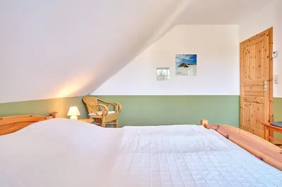 Ein Bett oder Betten in einem Zimmer der Unterkunft Am Redensee
