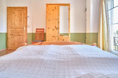 Ein Bett oder Betten in einem Zimmer der Unterkunft Am Redensee