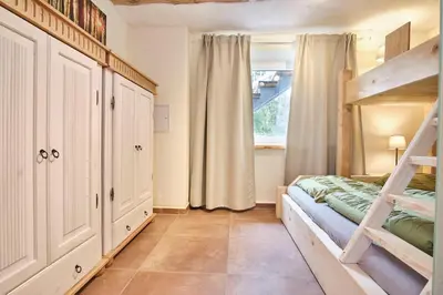 Ein Bett oder Betten in einem Zimmer der Unterkunft Aufschwung I Haushälfte
