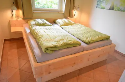 Ein Bett oder Betten in einem Zimmer der Unterkunft Sommerlust