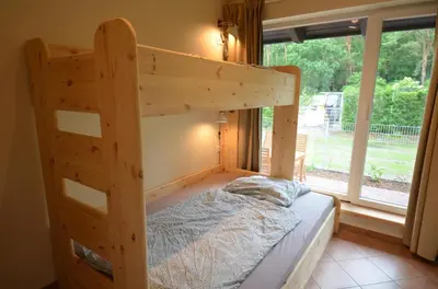 Ein Bett oder Betten in einem Zimmer der Unterkunft Sommerwind Haushälfte