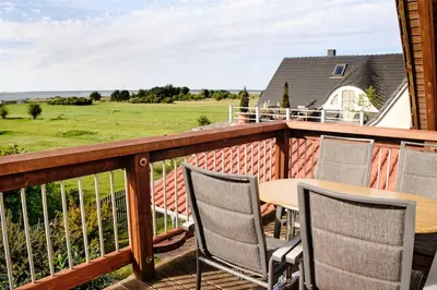 Ein Balkon oder eine Terrasse in der Unterkunft Aufwind II Haushälfte
