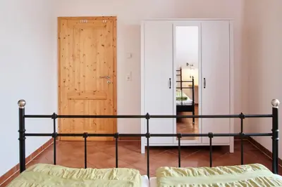 Ein Bett oder Betten in einem Zimmer der Unterkunft Aufwind I Haushälfte