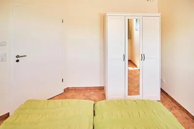 Ein Bett oder Betten in einem Zimmer der Unterkunft Waldlicht