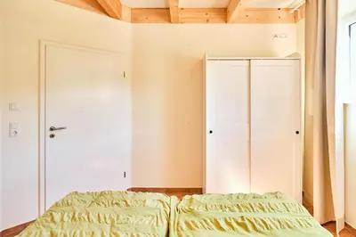 Ein Bett oder Betten in einem Zimmer der Unterkunft Waldlicht