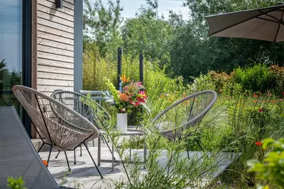 Ein Garten an der Unterkunft Strand Hus