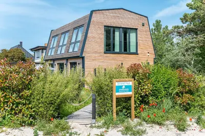 Ein Garten an der Unterkunft Strand Hus