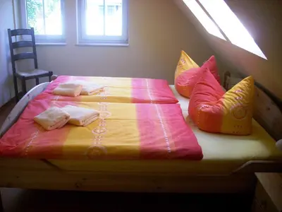 Ein Bett oder Betten in einem Zimmer der Unterkunft Ferienhaus zur Kranichweide