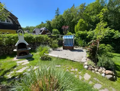 Ein Garten an der Unterkunft Ferienhaus Koralle im Fischerhof Born am Darß