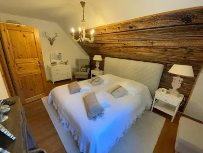 Ein Bett oder Betten in einem Zimmer der Unterkunft Ferienhaus Koralle im Fischerhof Born am Darß