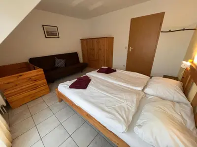 Ein Bett oder Betten in einem Zimmer der Unterkunft 