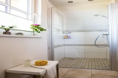 Ein Badezimmer in der Unterkunft Ferienhaus Schilfrohrsänger, Fuhlendorf