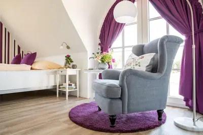 Ein Bett oder Betten in einem Zimmer der Unterkunft Ferienhaus Schilfrohrsänger, Fuhlendorf