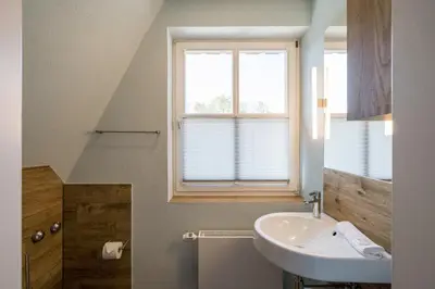 Ein Badezimmer in der Unterkunft Haus am Schilf - Wohnung 3