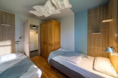 Ein Bett oder Betten in einem Zimmer der Unterkunft Haus am Schilf - Wohnung 1