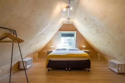 Ein Bett oder Betten in einem Zimmer der Unterkunft Haus am Schilf - Wohnung 6
