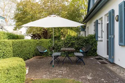 Ein Garten an der Unterkunft Haus am Schilf - Wohnung 5