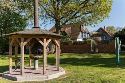 Ein Garten an der Unterkunft Haus am Schilf - Wohnung 5