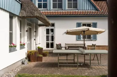 Ein Balkon oder eine Terrasse in der Unterkunft Haus am Schilf - Wohnung 5