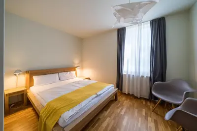 Ein Bett oder Betten in einem Zimmer der Unterkunft Haus am Schilf - Wohnung 5
