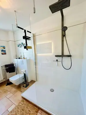 Ein Badezimmer in der Unterkunft Neptuns-Oase
