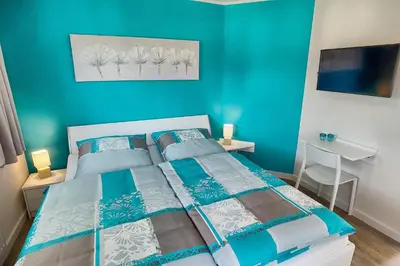 Ein Bett oder Betten in einem Zimmer der Unterkunft Ostseekristall - a63391