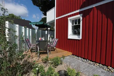Ein Garten an der Unterkunft Ostseekristall - a63391