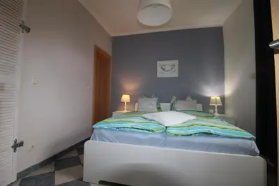 Ein Bett oder Betten in einem Zimmer der Unterkunft Kapitänshaus FW 2 EG re