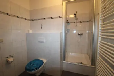 Ein Badezimmer in der Unterkunft Kapitänshaus FW 2 EG re