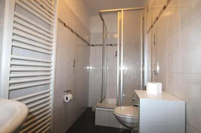 Ein Badezimmer in der Unterkunft Kapitänshaus FW 1 EG li