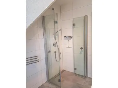 Ein Badezimmer in der Unterkunft Kormoran Wohnung 13
