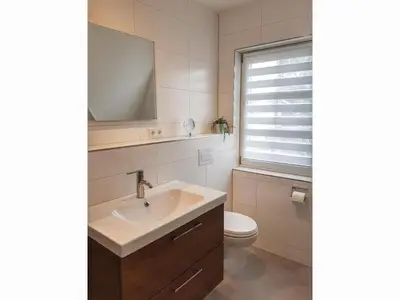 Ein Badezimmer in der Unterkunft Kormoran Wohnung 13