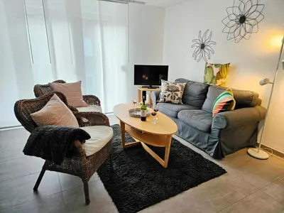 Ein Sitzbereich in der Unterkunft Birkenstrasse 11a Wohnung 6