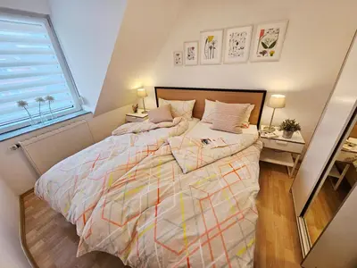 Ein Bett oder Betten in einem Zimmer der Unterkunft Birkenstrasse 11a Wohnung 6