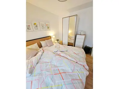Ein Bett oder Betten in einem Zimmer der Unterkunft Birkenstrasse 11a Wohnung 6