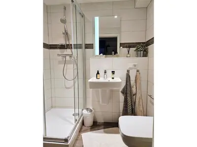 Ein Badezimmer in der Unterkunft Birkenstrasse 11a Wohnung 6