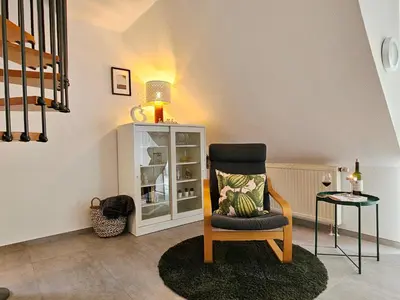 Ein Sitzbereich in der Unterkunft Birkenstrasse 11a Wohnung 6