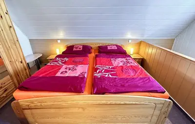 Ein Bett oder Betten in einem Zimmer der Unterkunft Ferienhaus für 2 Personen mit Terrasse