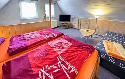 Ein Bett oder Betten in einem Zimmer der Unterkunft Ferienhaus für 2 Personen mit Terrasse