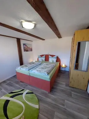 Ein Bett oder Betten in einem Zimmer der Unterkunft Ferienhaus für 2 Personen mit Terrasse