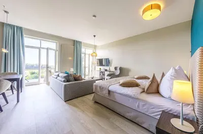 Ein Bett oder Betten in einem Zimmer der Unterkunft Alte Seefahrtschule App 33 