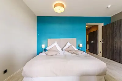 Ein Bett oder Betten in einem Zimmer der Unterkunft Alte Seefahrtschule App 33 