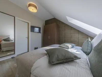Ein Bett oder Betten in einem Zimmer der Unterkunft Alte Seefahrtschule App 86 