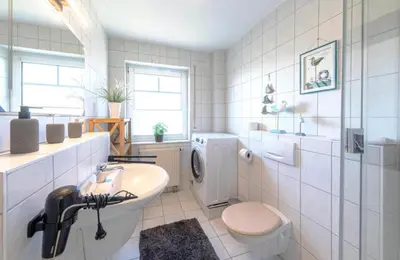 Ein Badezimmer in der Unterkunft Darßer Weg 36a Whg 10 